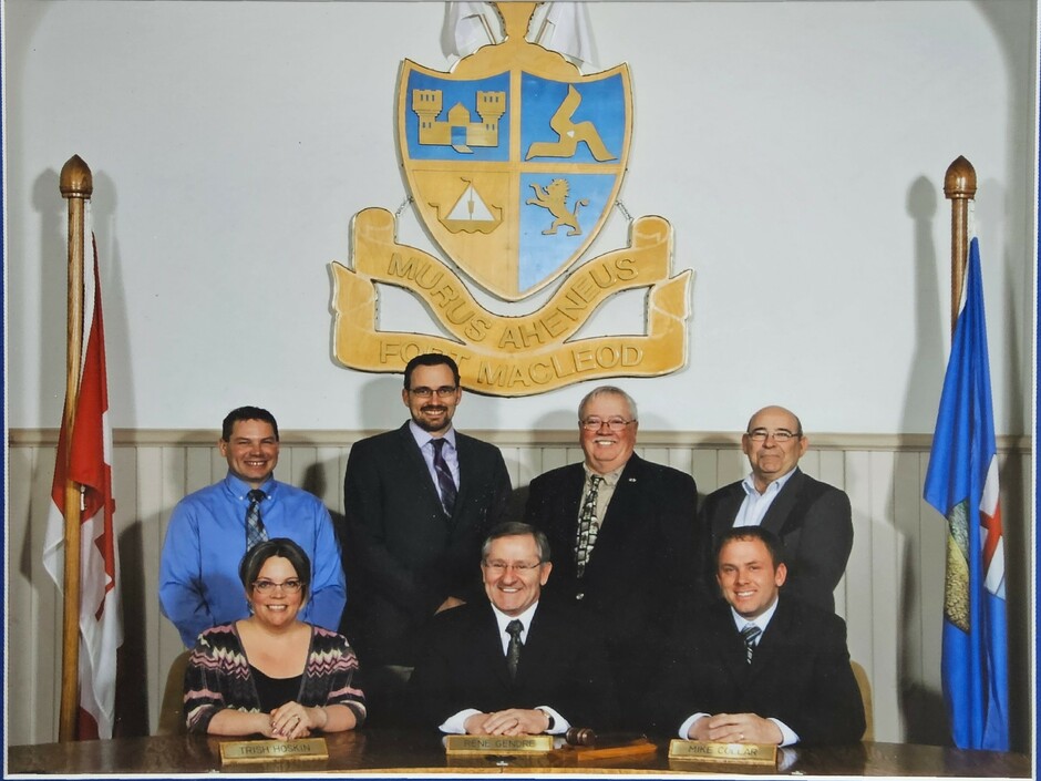 Back Row (Left to Right): Councillors Michael Dyck, Brent Feyter, Gord Wolstenholme, and Keith Trowbridge. Front Row (Left to Right): Councillor Trish Hoskin, Mayor Rene Gendre, and Councillor Mike Collar.